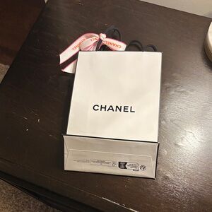 Chanel White Bag with Black Handles and Pink Ribbon